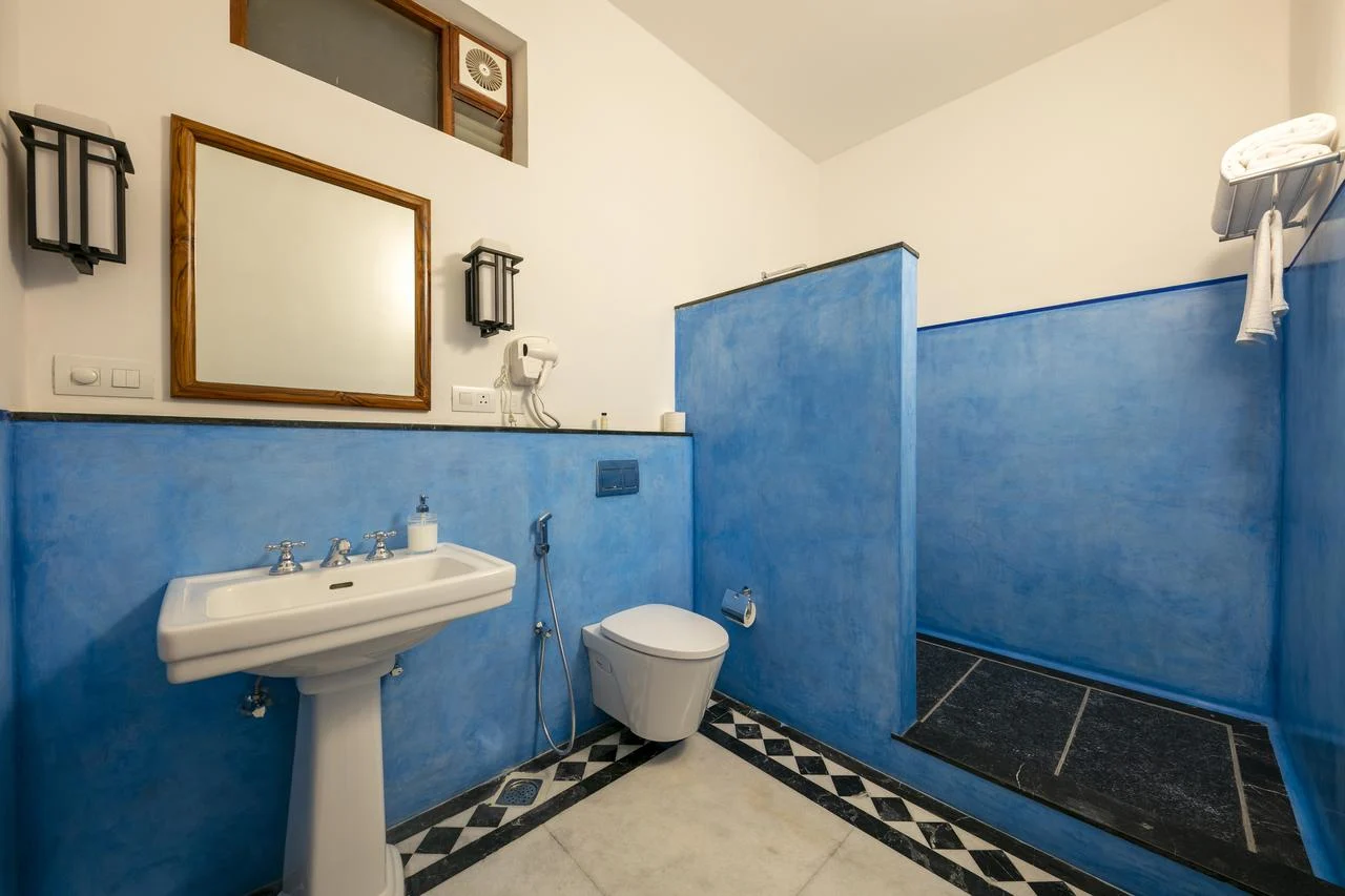 Original heritage room bathroom with blue tiles